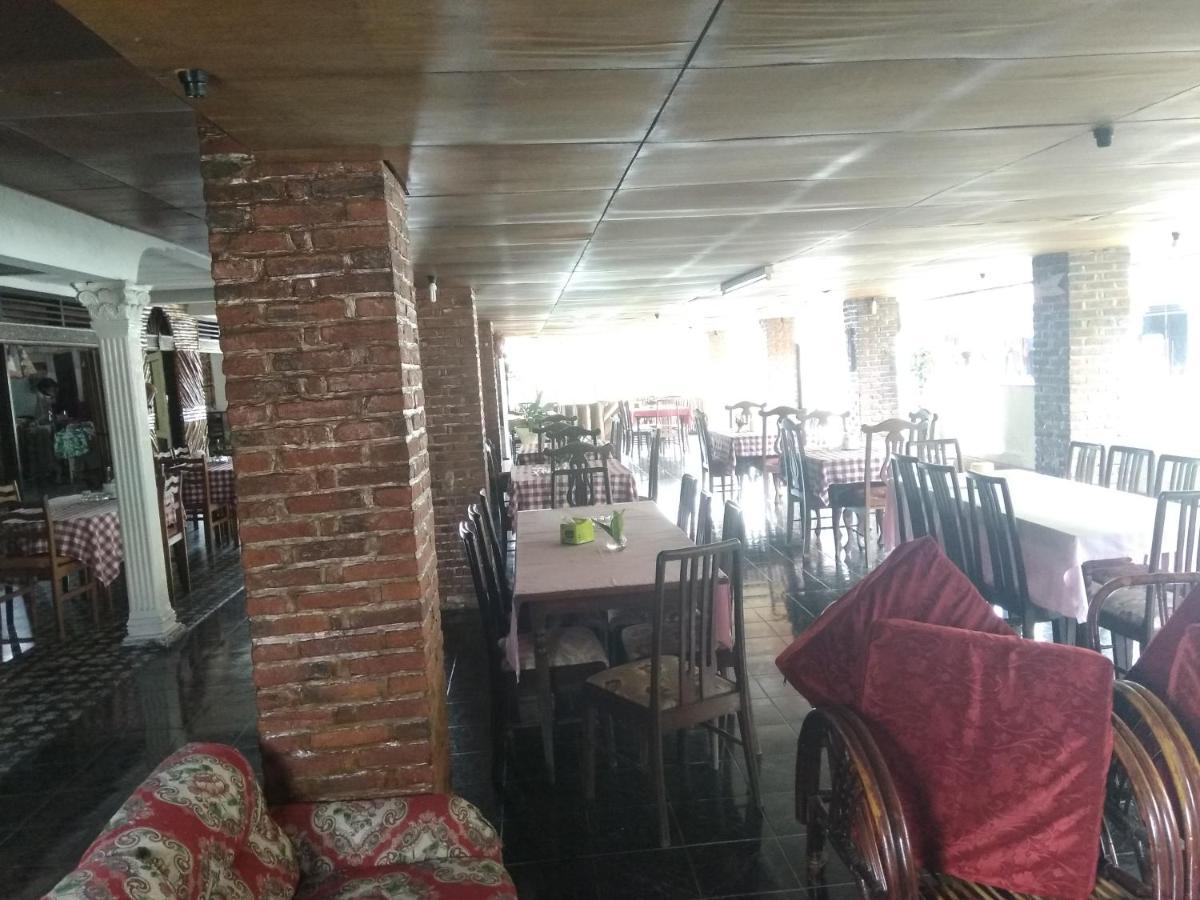 Bernard Guest House & Resto Redpartner Ambarita ภายนอก รูปภาพ